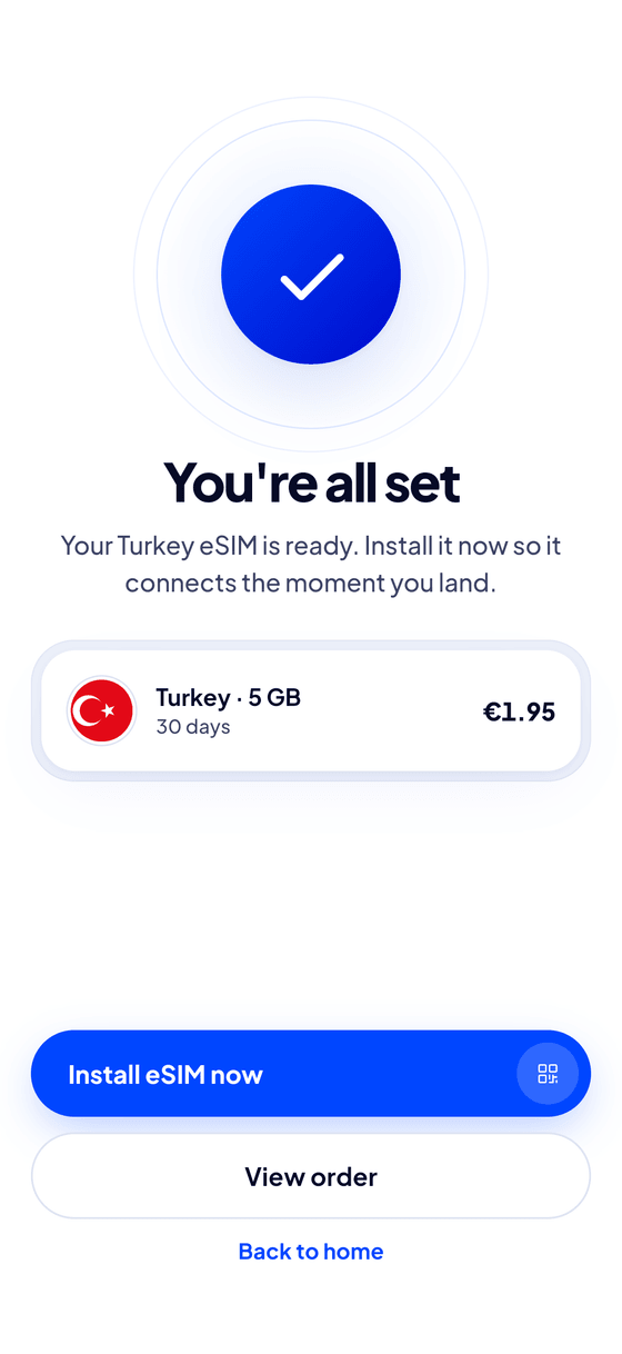 Install the eSIM at home. On recent iPhones the app does it in one tap.